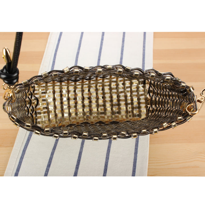 Shoulder bag made of handwoven synthetic material with fashionable sliding mechanism Bowlift