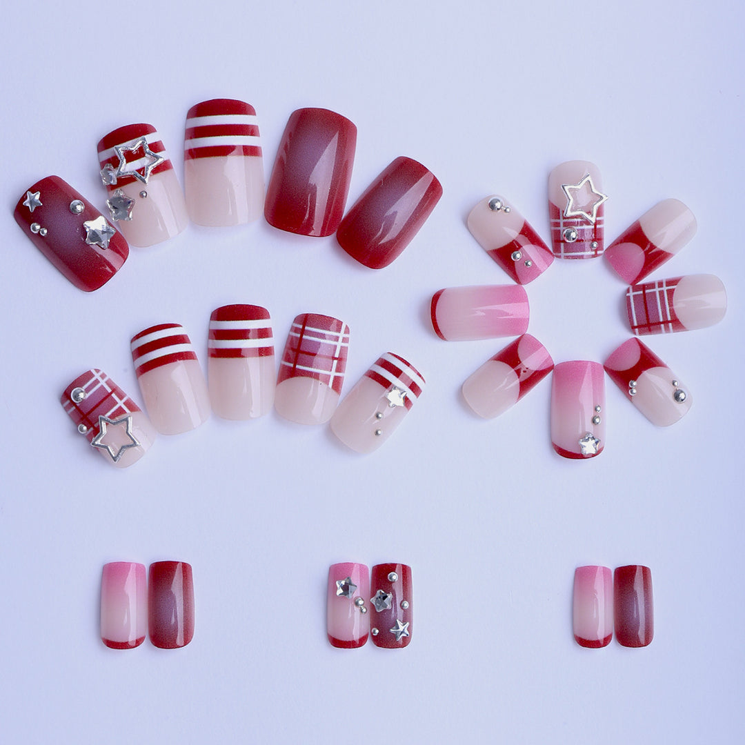 Artificial fingernails with handcrafted star decorations Bowlift