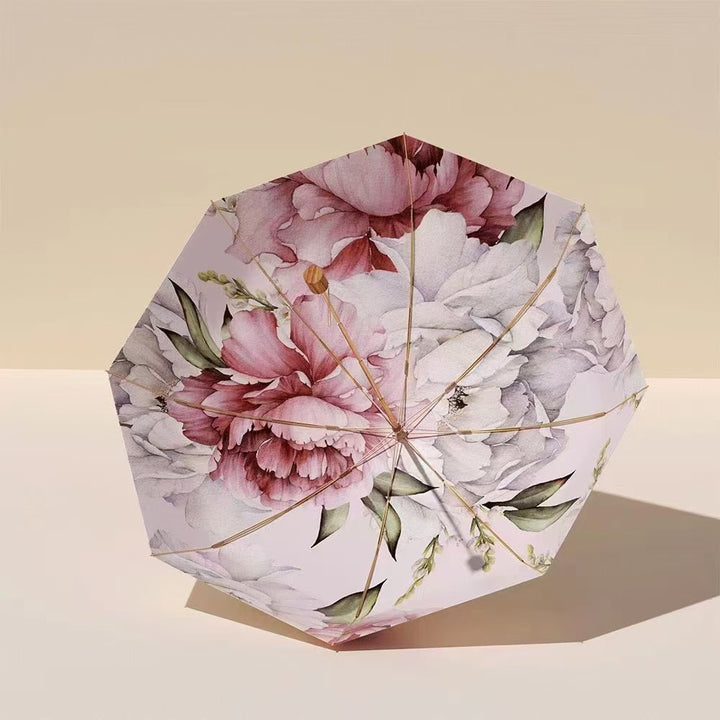 Women's elegant folding umbrella with floral patterns Bowlift