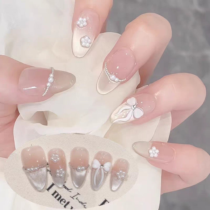 Artificial nails with elegant, adorned tips Bowlift