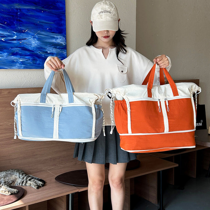 Sporty travel bag with smart organizer compartments Bowlift