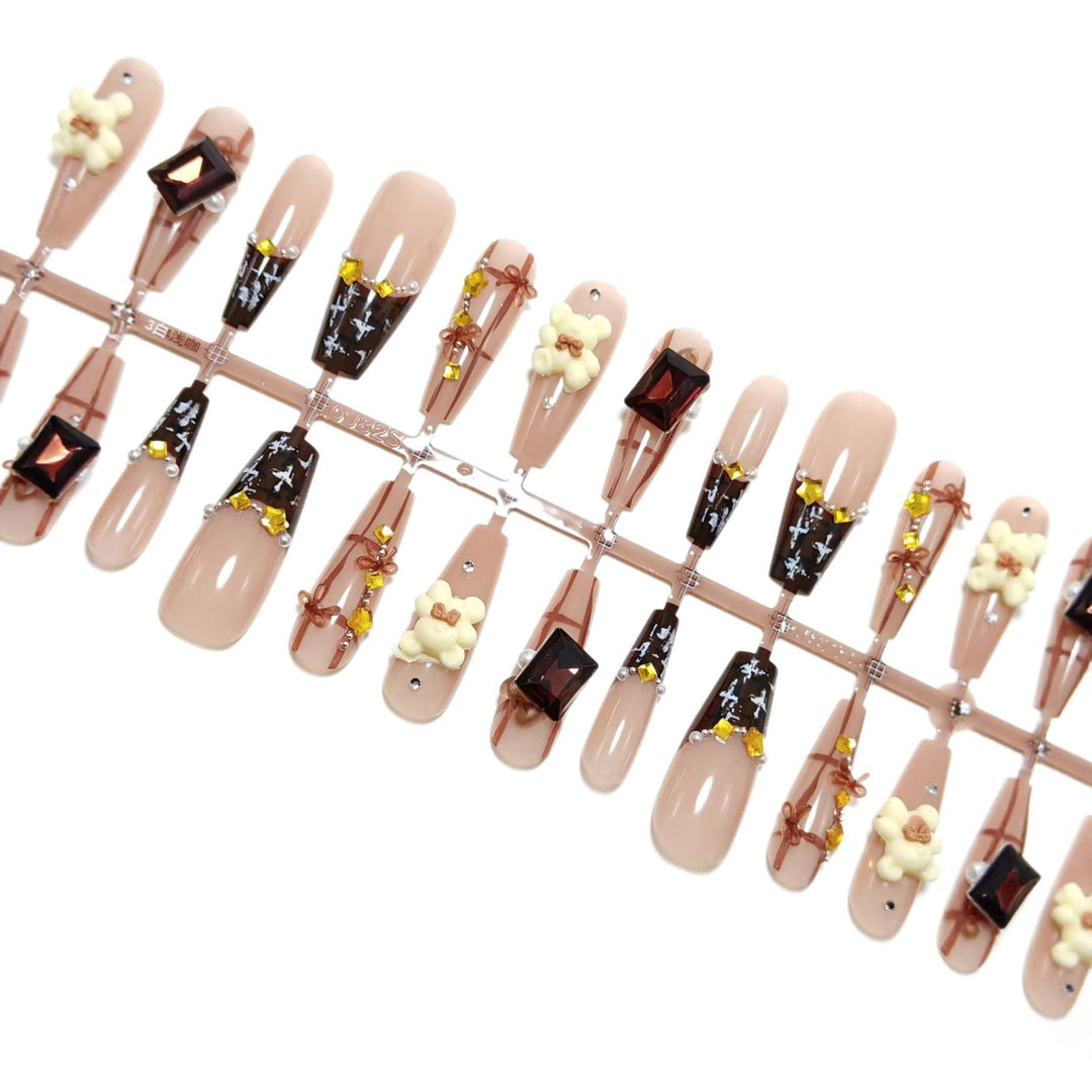 Artificial nails with playful animal designs and glitter effects Bowlift