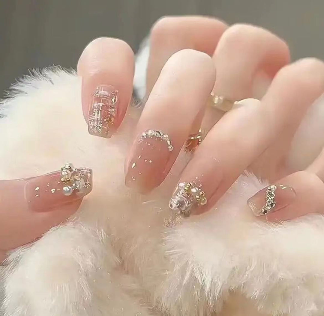 Elegant Nail Art with Glitter and Rhinestones Bowlift