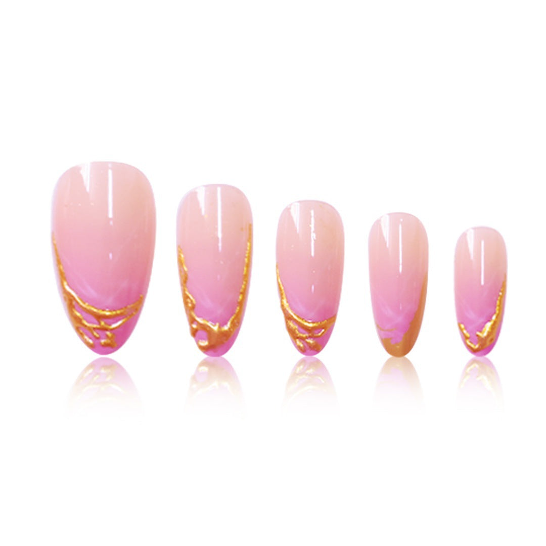 Elegant Stiletto Press-On Nail Extensions with Gold Tip Accents Bowlift