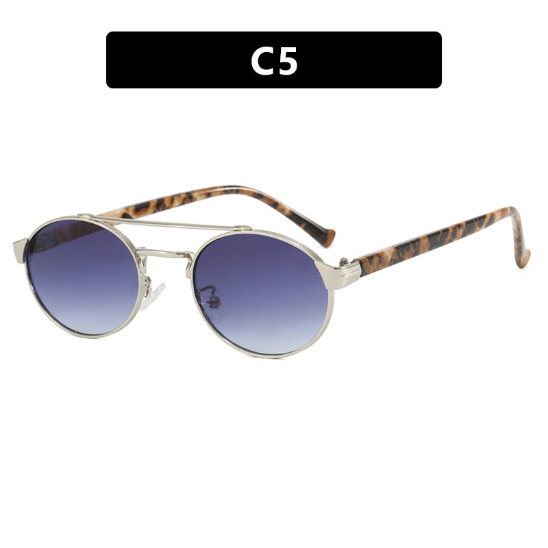 Ladies fashionable sunglasses in stylish round design with golden accents Bowlift