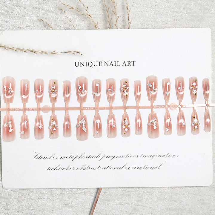 Artificial nail set with elegant glitter and flower decorations Bowlift