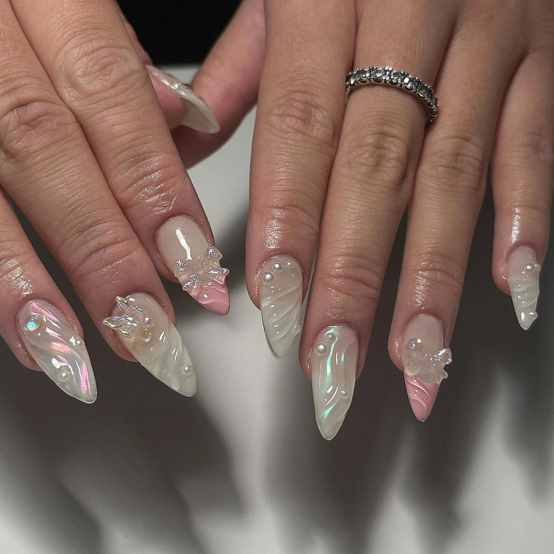Artful stiletto nails with glitter and butterfly design Bowlift