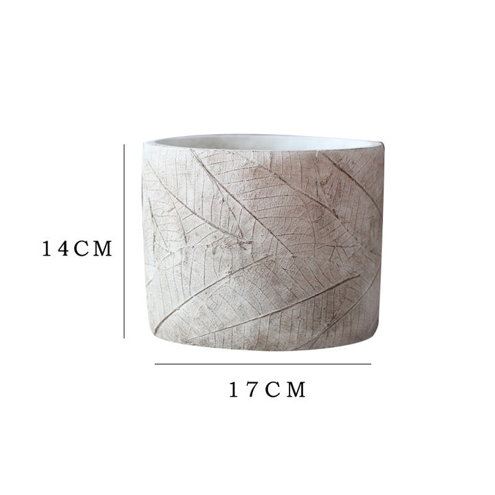 Decorative plant container made of handmade ceramic with leaf pattern Bowlift