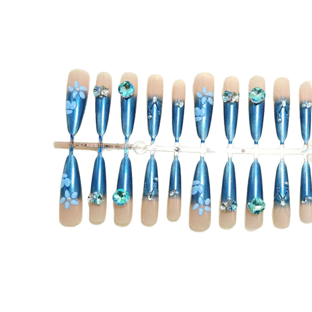 Elegant artificial nails with floral applications and glitter elements Bowlift