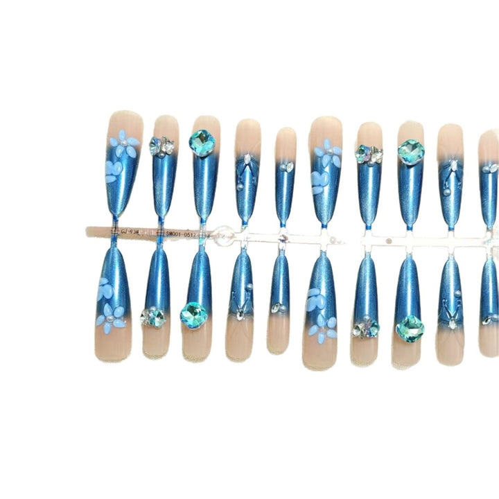 Elegant artificial nails with floral applications and glitter elements Bowlift