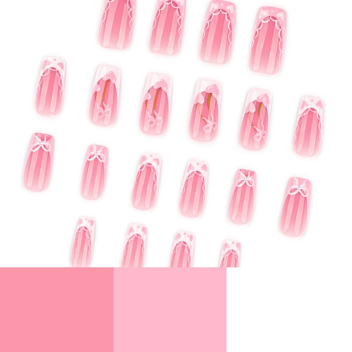 Artistic Nail Extensions with Playful Floral Design Bowlift