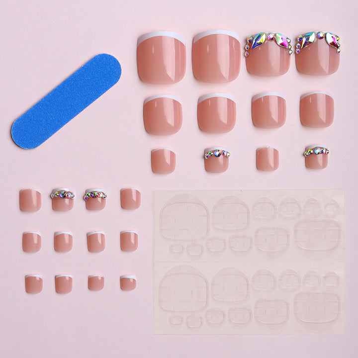 Acrylic nails with luxurious rhinestone embellishments Bowlift