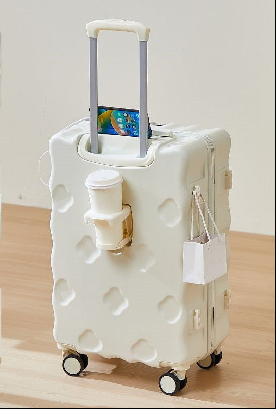 hard-shell carry-on suitcase with integrated foldable cup holder phone cradle USB charging port and external bag hooks Bowlift