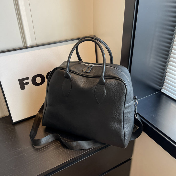Stylish and Spacious Travel Bag with Versatile Carrying Options Bowlift