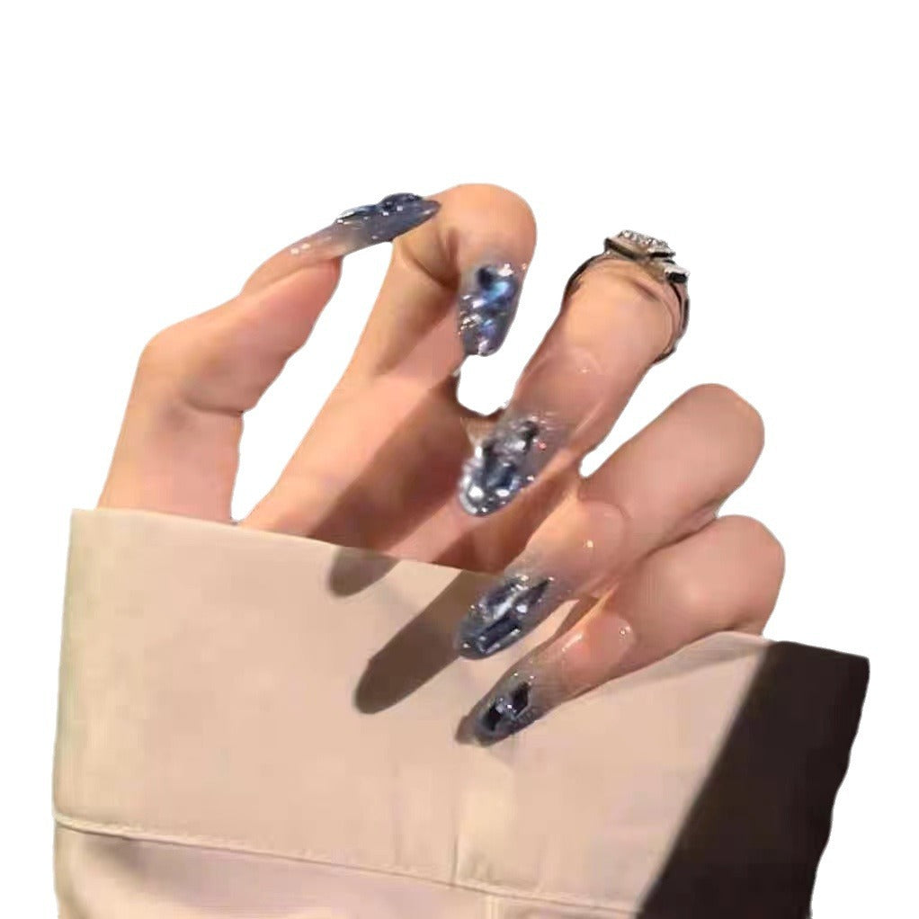 Artificial nails in creative moon and star design Bowlift