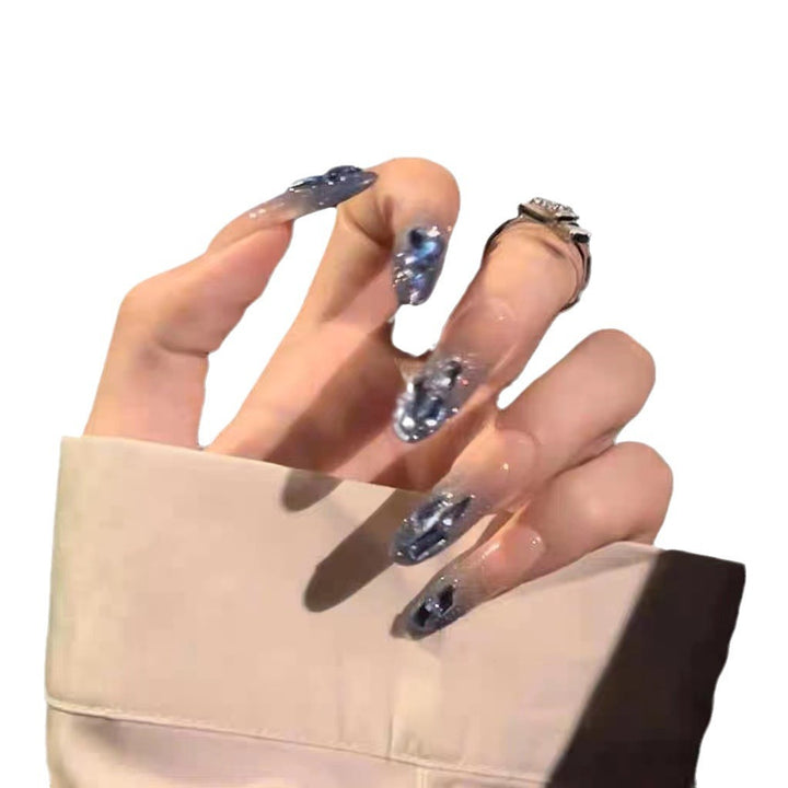 Artificial nails in creative moon and star design Bowlift