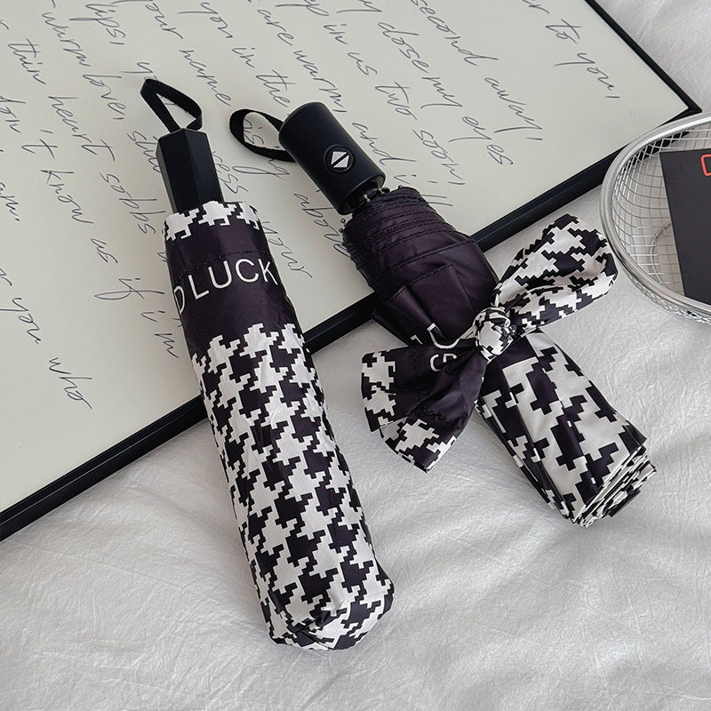 Women Folding Umbrella with Modern Wave Pattern Bowlift