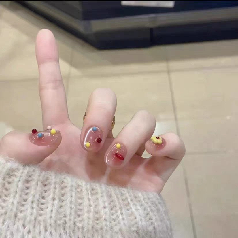 Artificial nails with playful decor Bowlift