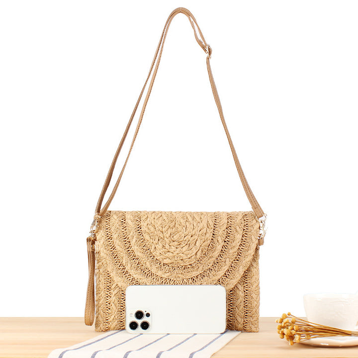 Shoulder bag made of high-quality woven natural material with elegant wave pattern Bowlift
