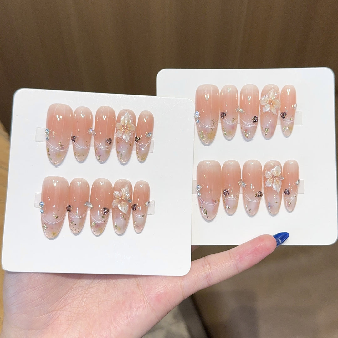 Artificial nails with delicate flower and glitter detail Bowlift