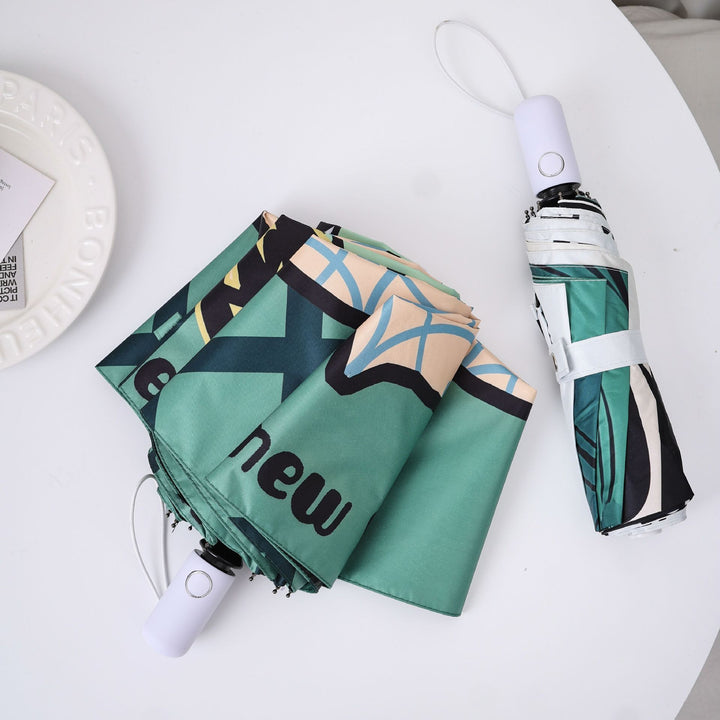 Ladies creative folding umbrella with graphic design Bowlift