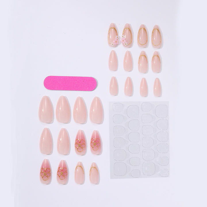 Acrylic nail set with elegant flower and gold decorations Bowlift