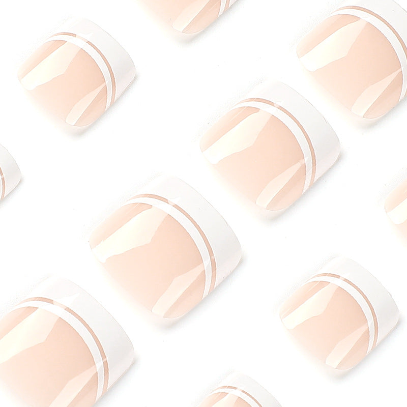 Artful toenail art with elegant French tip design Bowlift