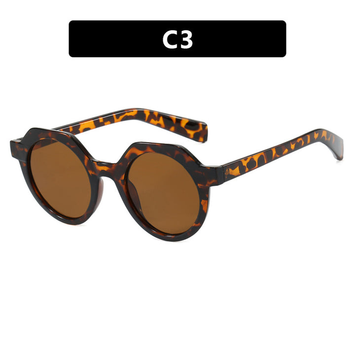 Ladies extravagant round sunglasses with colored accented frame Bowlift