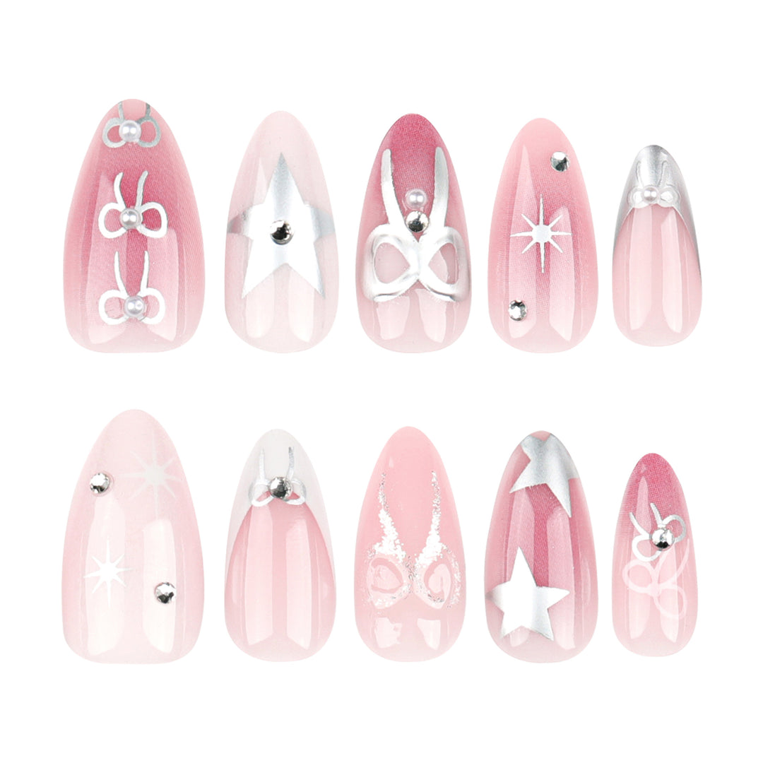 Artful nail extensions with elegant 3D embellishments Bowlift