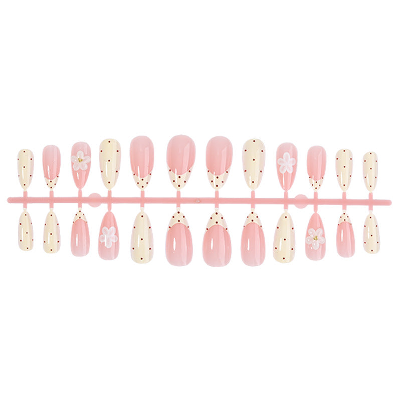 Elegant Press-On Nail Set with Floral and Polka Dot Designs Bowlift