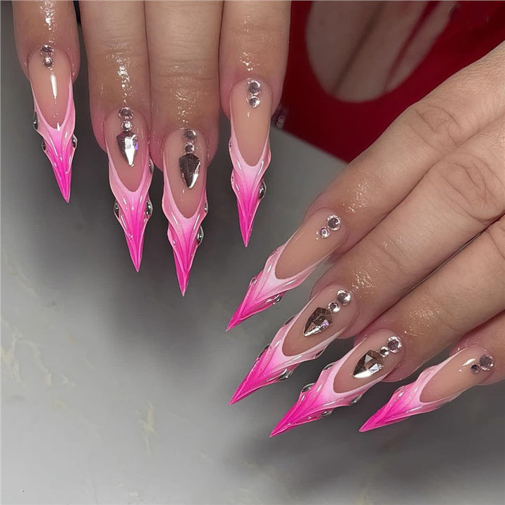 Artistic Stiletto Press-On Nail Art with Metallic Accents Bowlift