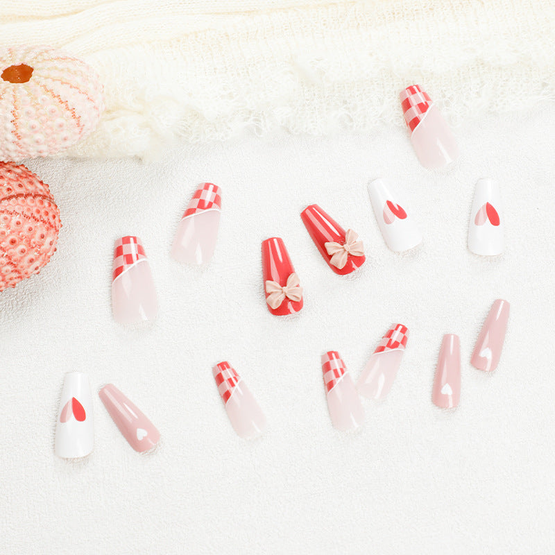 Artful nail extensions with playful designs and romantic accents Bowlift
