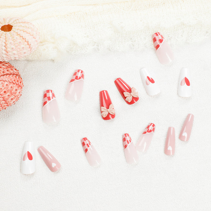 Artful nail extensions with playful designs and romantic accents Bowlift