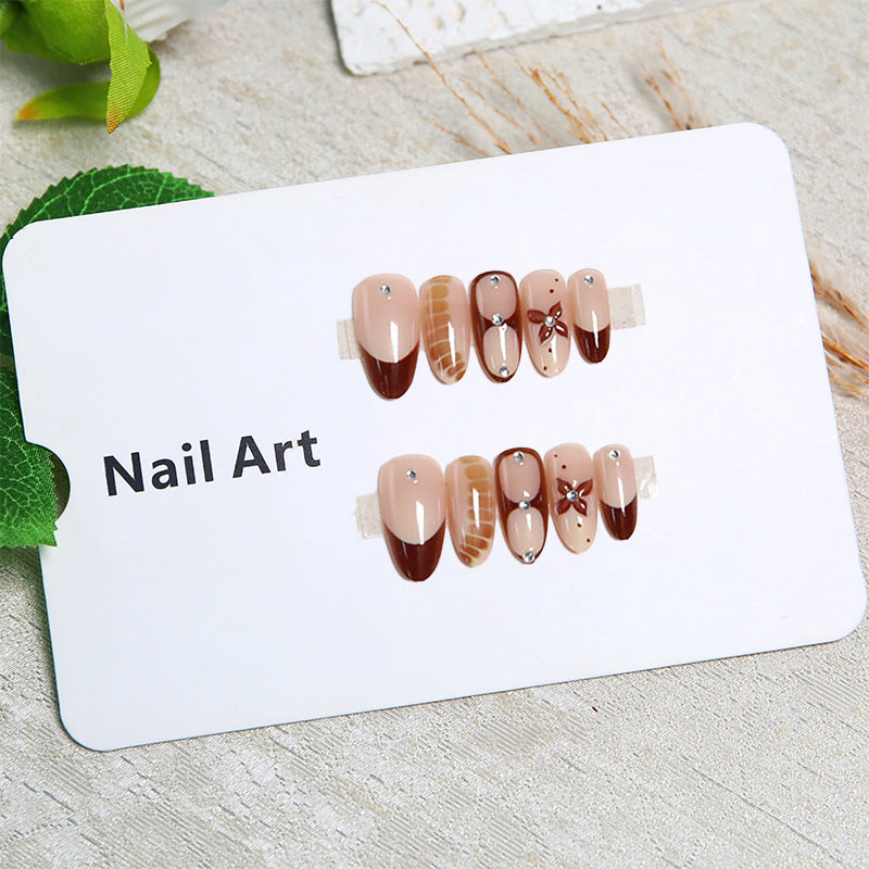 Artificial nails with elegant motif designs Bowlift