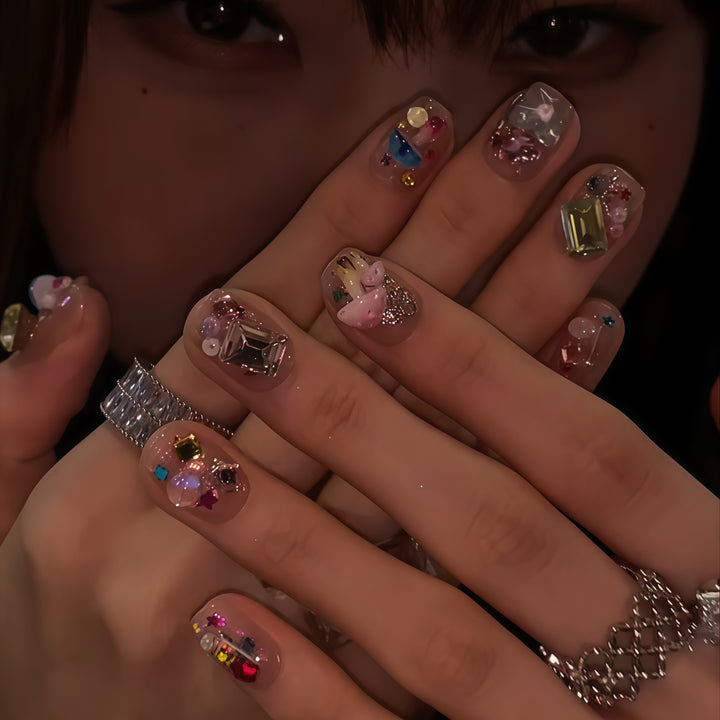 Artificial nails with sparkling crystal accents Bowlift
