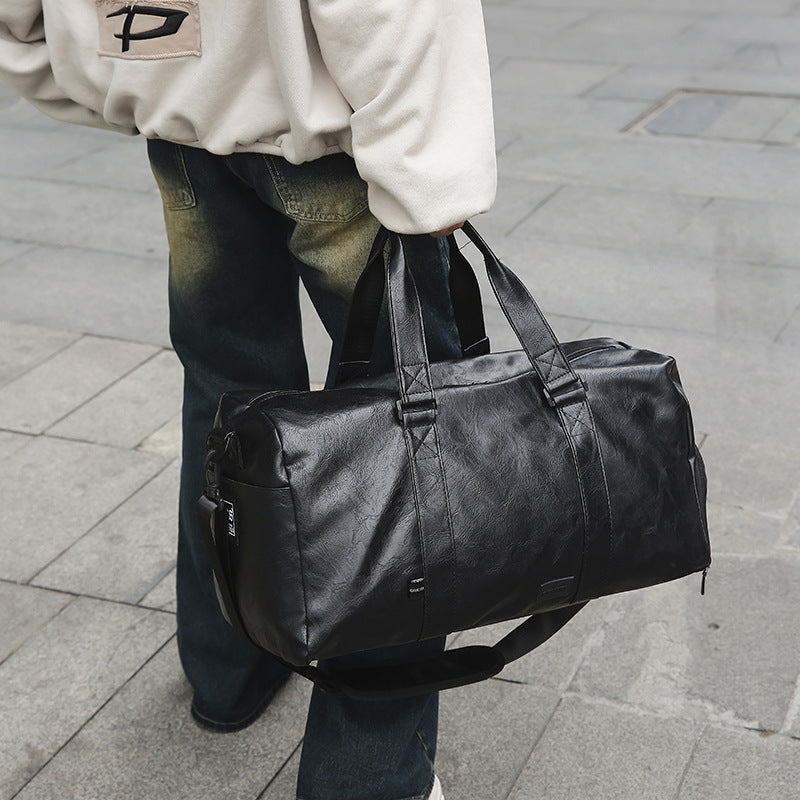 Multifunctional Sports and Travel Bag Made of Durable Synthetic Leather Bowlift
