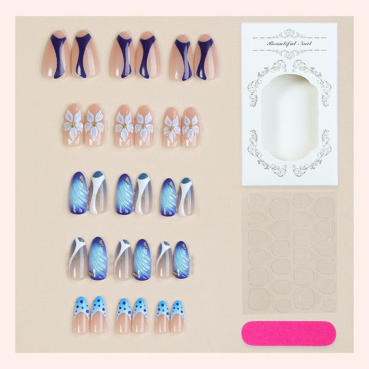 Nail set with handmade floral designs and elegant glitter Bowlift