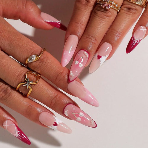 Artificial nail set with romantic heart and bow motifs Bowlift