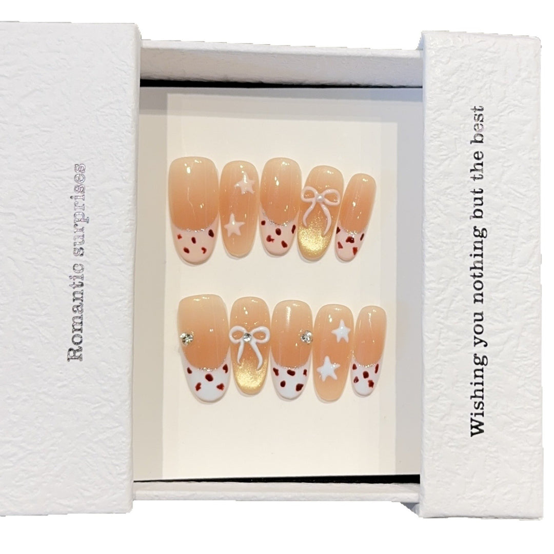 Artificial nails with decadent design and romantic accents Bowlift