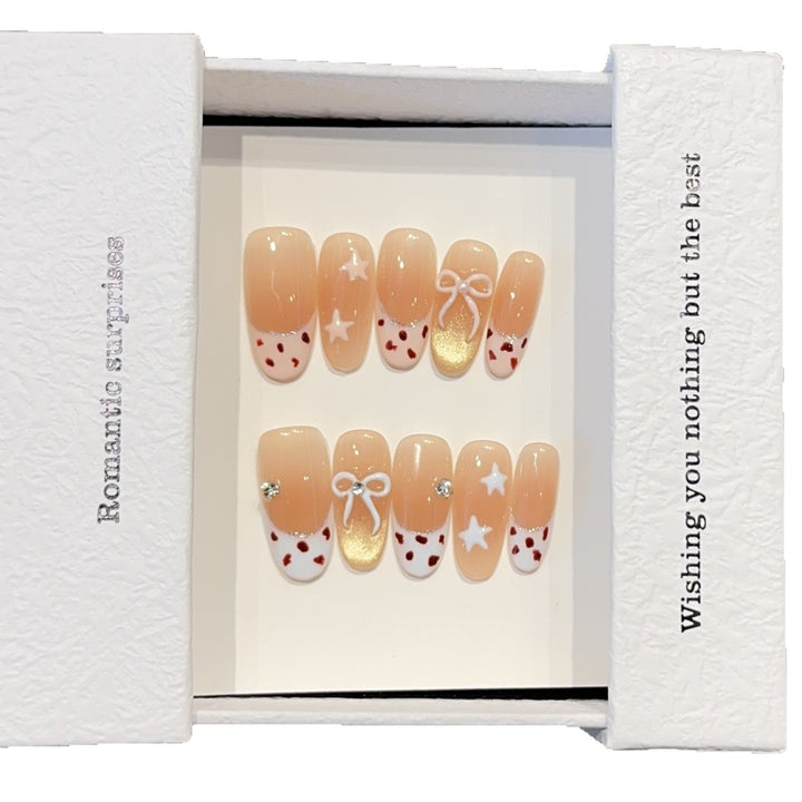 Artificial nails with decadent design and romantic accents Bowlift