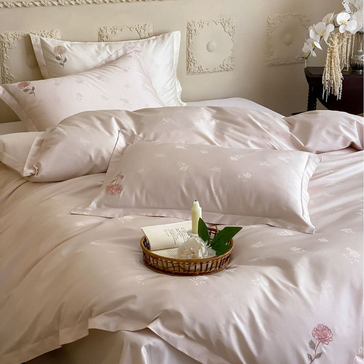Luxurious cotton satin bedding set with delicate rose embroidery and silky shiny surface