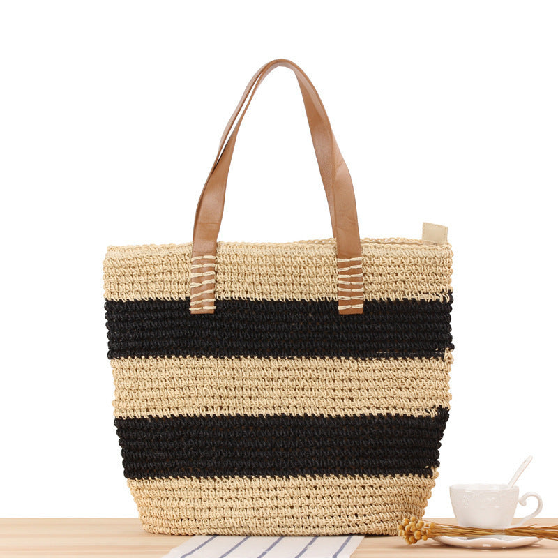 Spacious straw bag with elegant leather handles Bowlift