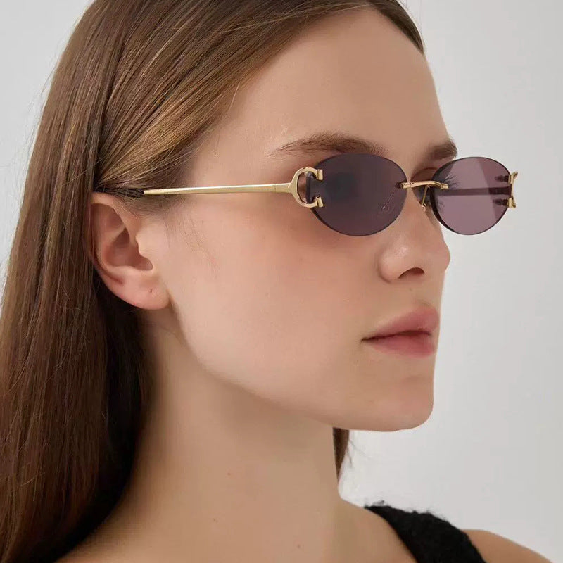 Women's elegant oval-shaped sunglasses with fashionable metal frame Bowlift