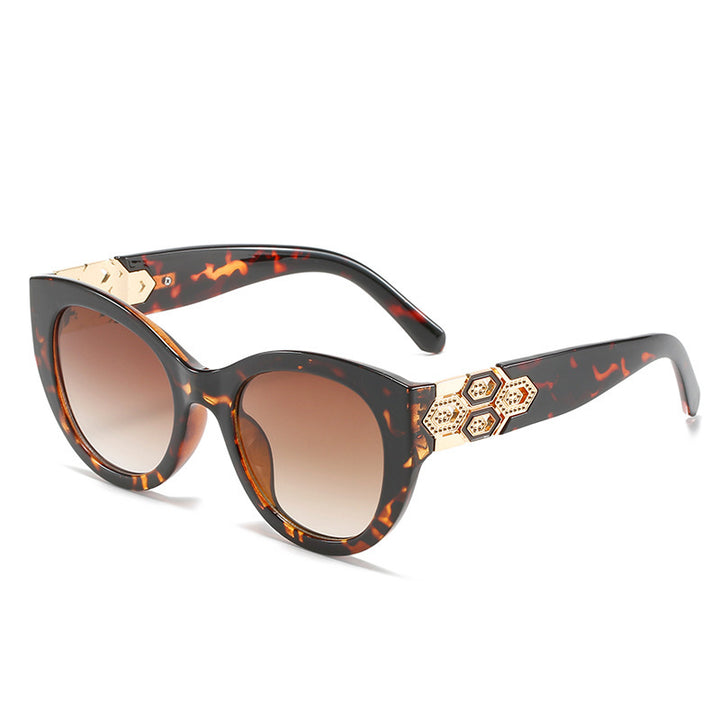 Fashion-Forward Cat-Eye Sunglasses with Decorative Accents Bowlift