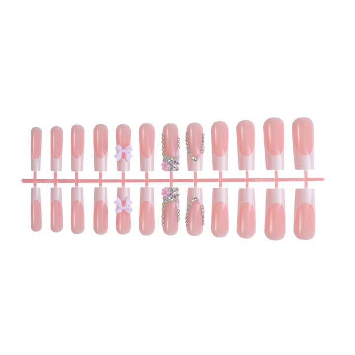 Artificial nail set with delicate details and glamorous decorations Bowlift
