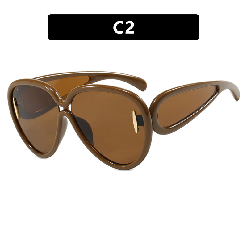 Women extravagant sunglasses in creative design Bowlift