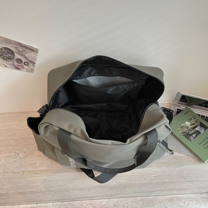 Travel and Sports Bag with Water-Repellent Material and Many Compartments Bowlift