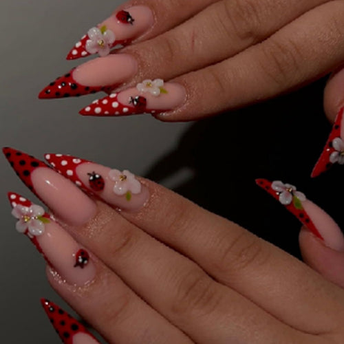 Artistic Press-On Nails with Floral and Polka Dot Design Bowlift