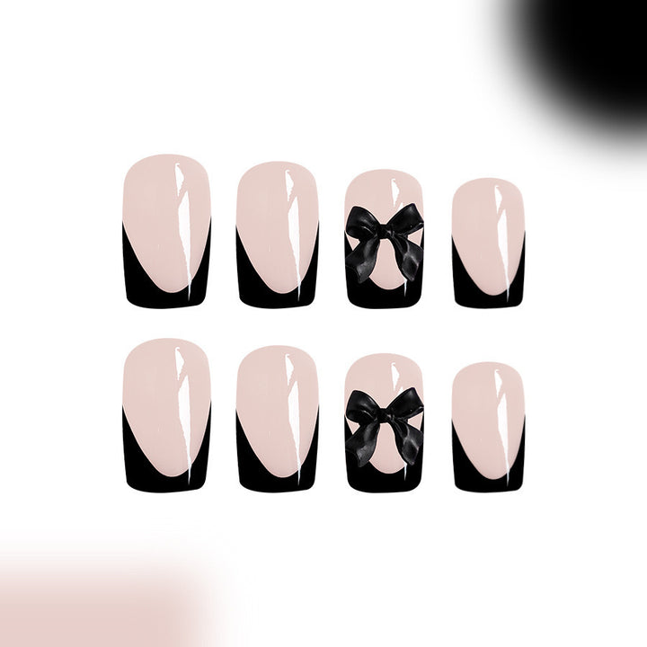 Artificial nail set with glamorous bow decorations Bowlift