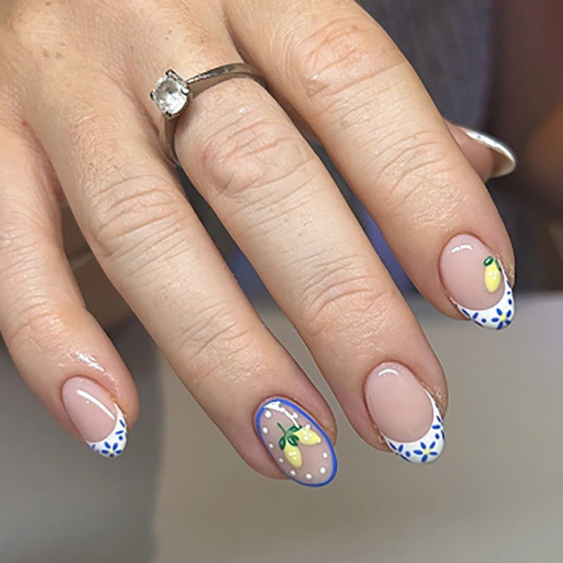 Artful stiletto nails with elegant floral design and glitter details Bowlift